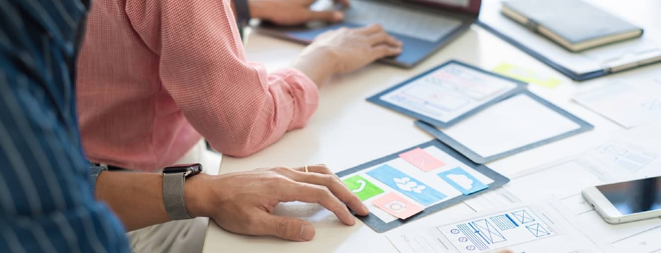 Designers working at a desk